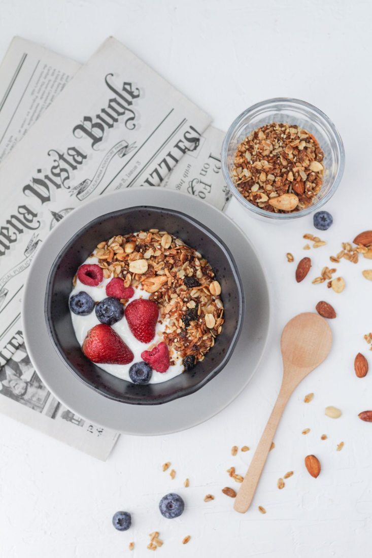A yogurt bowl with berries and toppings